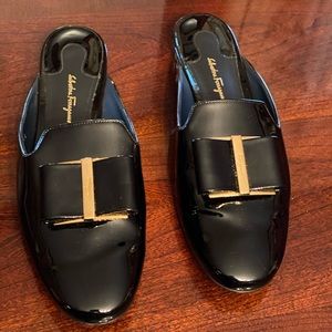Black flat mules. Salvador Ferragamo